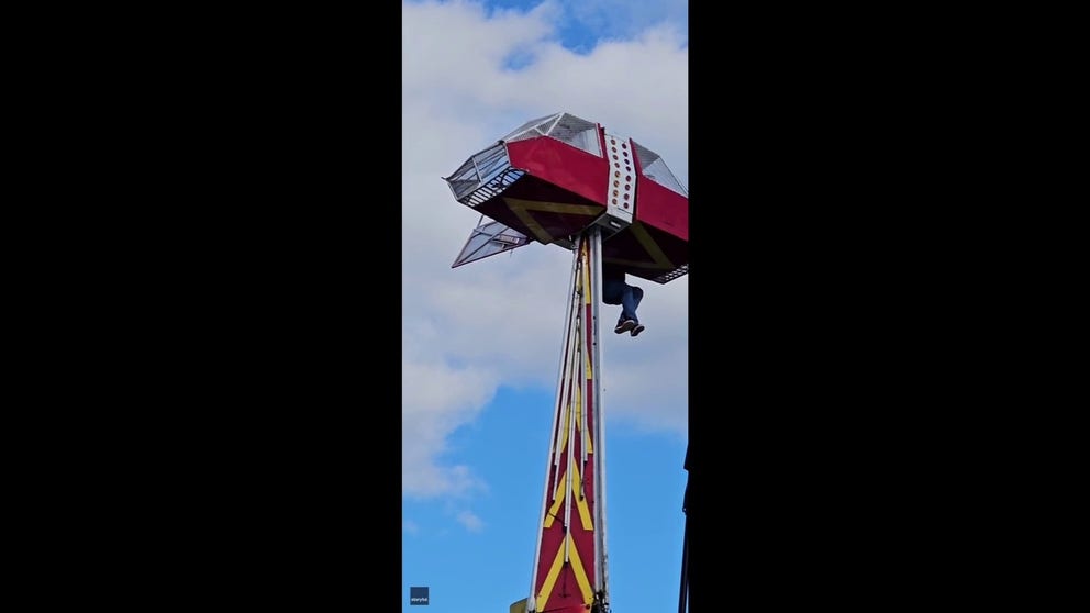 A freak gust of wind disabled a ride and sent the car 30 feet into the air with the door open. A young girl was inside, and the carnival worker clung to the car for his life, getting inside just moments before the ride descended again.