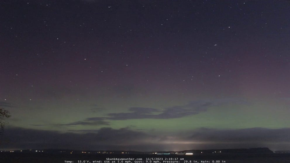 A timelapse video from Skunkbay Weather taken on Sunday morning shows the Northern Lights dancing above Seattle in connection with a geomagnetic storm watch. 