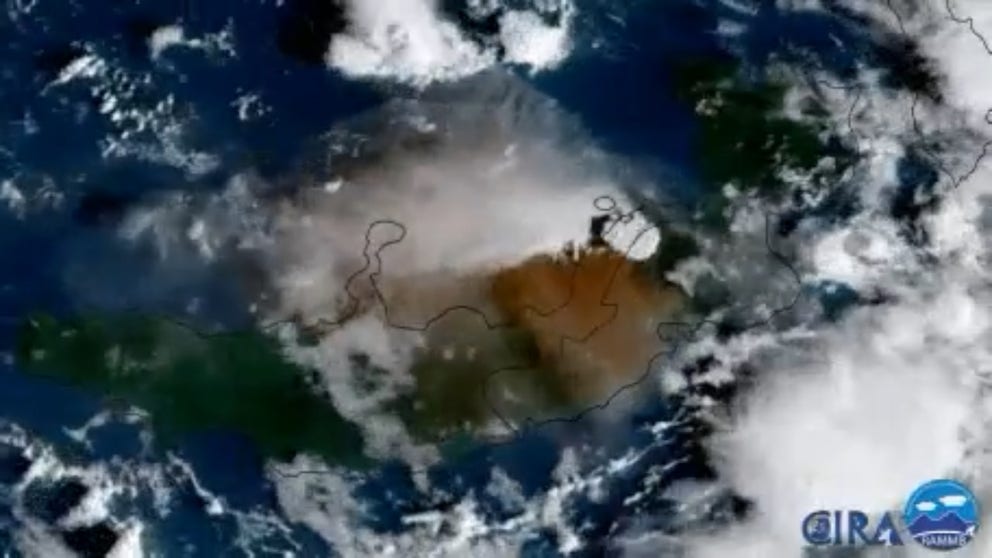 Mt. Ulawun erupted in Papua New Guinea Tuesday, sending an ash and steam plume miles high across the region and snarling local air traffic. (Satellite courtesy: NOAA / CIRA)