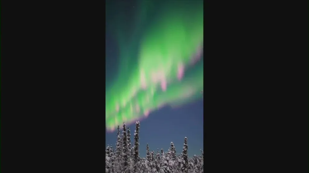 Fairbanks, Alaska, skywatchers were treated Sunday night to a colorful aurora dancing over the freshly fallen snow.