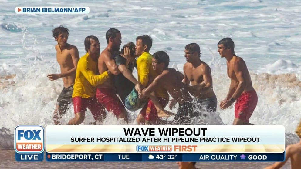 FILE VIDEO: A professional Brazilian surfer was hospitalized Sunday in Hawaii after wiping out on Ohau's North Shore while practicing for an upcoming Pipeline surfing competition. 