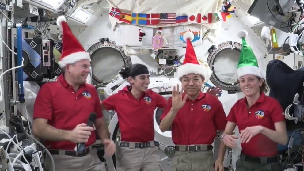Astronauts aboard the International Space Station share their holiday messages.