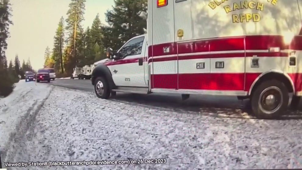Body cam footage captured a driver crashing into a police cruiser and ambulance on Tuesday due to the icy roads in Sisters, Oregon.