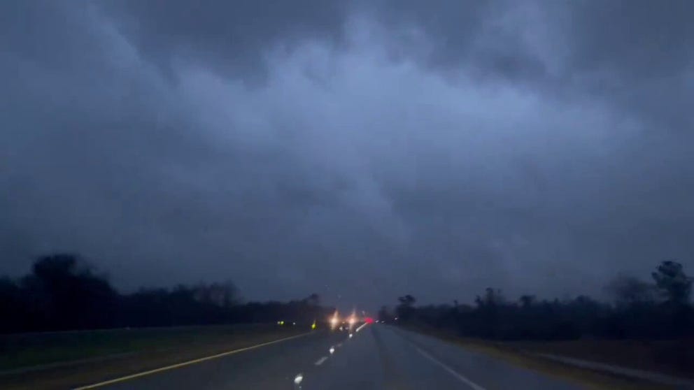Video recorded in Marianna, Florida, shows what appears to be a possible tornado crossing Interstate 10 early Tuesday morning.
