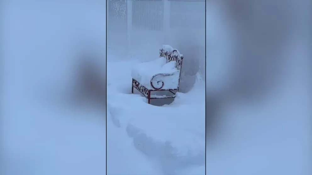 Footage filmed by Marcus Todd Pitman shows snowy conditions on Tuesday morning outside his home in downtown Columbus, Nebraska, where 13 inches of snow fell.