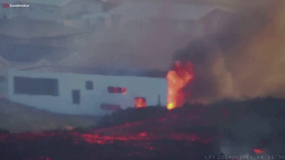 Dramatic video shows homes being destroyed by a lava flow in the town of Grindavik in Iceland after a volcano erupted early Sunday morning.