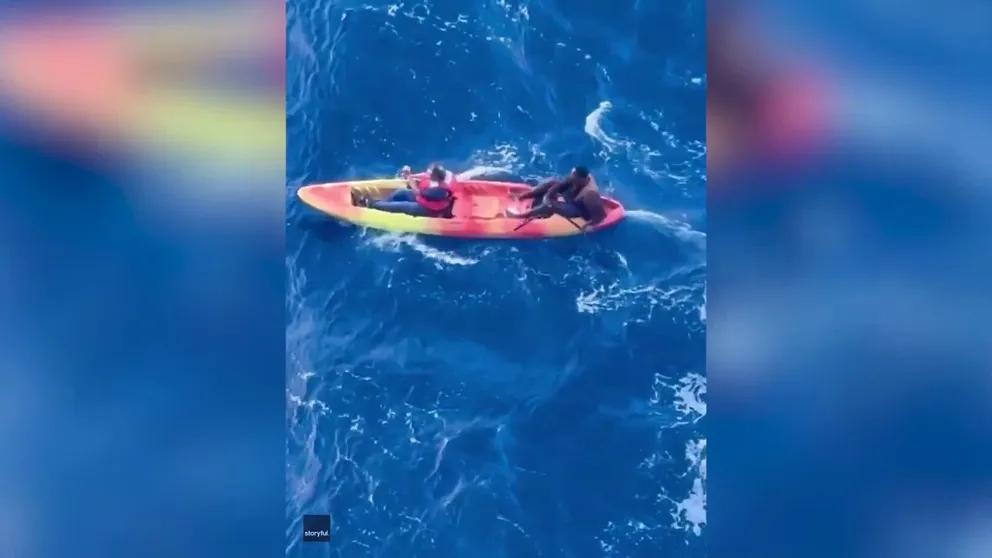 Two men were rescued by a Carnival cruise ship on Monday. Once onboard, the men were evaluated by the ship’s medical staff and given first aid and food. (Courtesy: Amir Najafi via Storyful)
