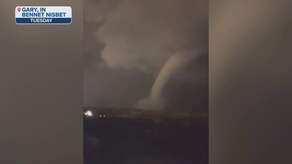Dramatic video recorded near Gary, Indiana, shows a tornado sweeping across the landscape during severe weather in the Midwest and Ohio Valley Tuesday night.