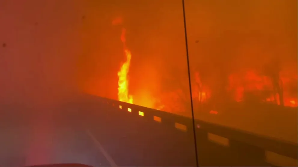 The intensity of the fire in the Texas Panhandle on Tuesday was captured in a video recorded by a crewmember from Greenville Fire-Rescue. The video shows their truck driving through the flames, sparks, and smoke during their response in the area.