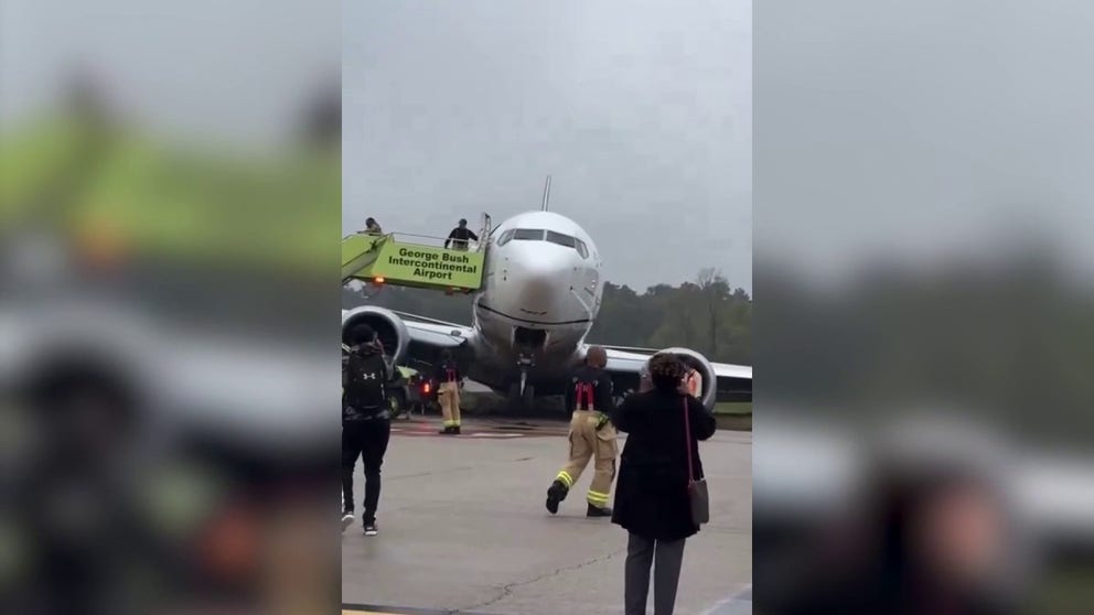 Video shows passengers exiting a United Airlines flight that went off of the taxiway at George Bush Intercontinental Airport in Houston on Friday morning. (Video credit: @VickiO_theDO/Twitter)