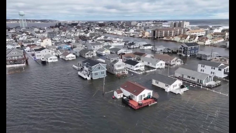 Hampton Beach, New Hampshire, was flooded by the ocean for the second time this year on Sunday as a powerful storm pushed seawater ashore.
