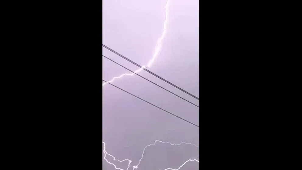 A driver thought he was just going to get video of lightning over San Jose. This is a close up of the video that shows the lightning striking the plane and blue sparks afterwards.