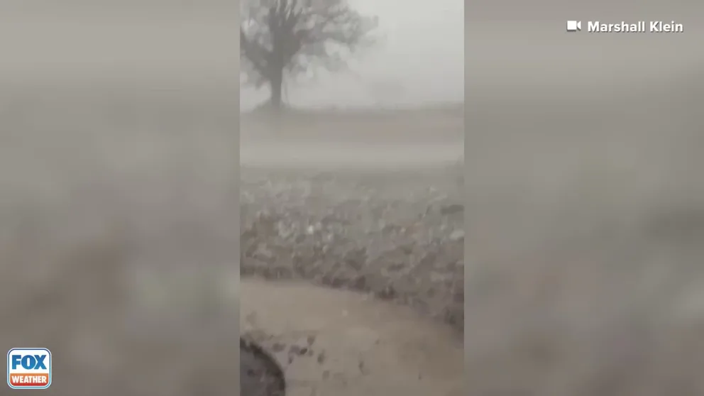 Video shows hail covering the ground in Boyd, Texas, on April 1, 2024.