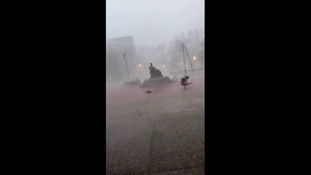 Video that you have to see to believe, strong winds from a severe thunderstorm knocked this University of Kentucky student to the ground Tuesday morning.