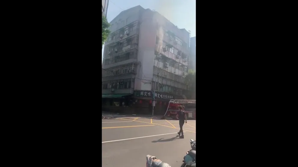 Video recorded in Taiwan shows thick smoke billowing from inside a building that was heavily damaged during a powerful earthquake on Wednesday, March 3, 2024.