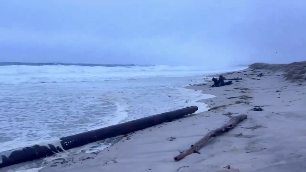 Video recorded on Cape Cod in Massachusetts shows waves crashing onto the beach in Orleans amid high winds from a powerful nor'easter pushing through the region.