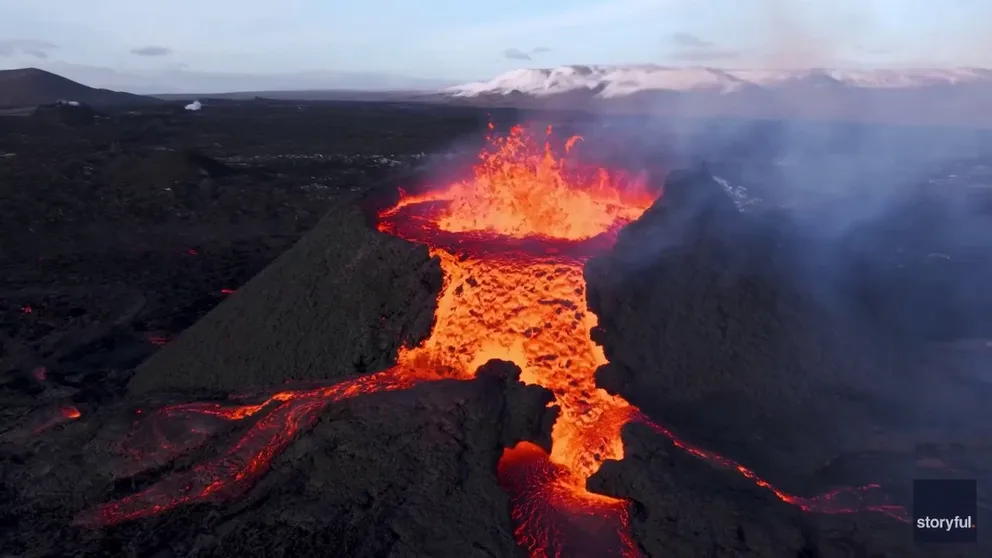 Drone footage recorded on Sunday, April 7 shows lava spewing from a volcanic crater on Iceland's Reykjanes peninsula. The volcano eruption is ongoing north of Grindavik.