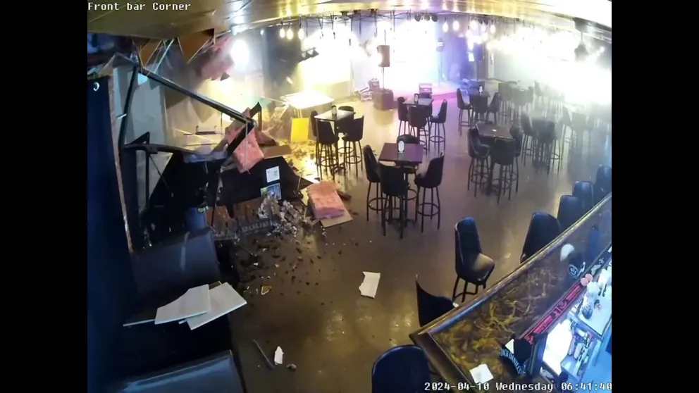 The Library Riot bar in Lake Charles, Louisiana was no match for an EF-2 tornado. Security video caught it all on camera. Listen as the tell-tale "freight train" sound roars then watch as the cameras start shaking with the walls. The 155 mph winds then send the wall into vending machines and everything crumbles on the floor. The tornado is gone, and the scene quiet, just as fast as it appeared. 
