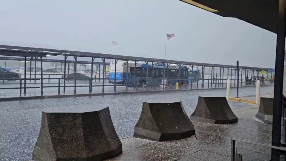 A severe storm passed over Dulles Airport near Washington, D.C. and dropped hail that came down so fast, it looked like snow. The FAA issued a ground stop until the threat passed.