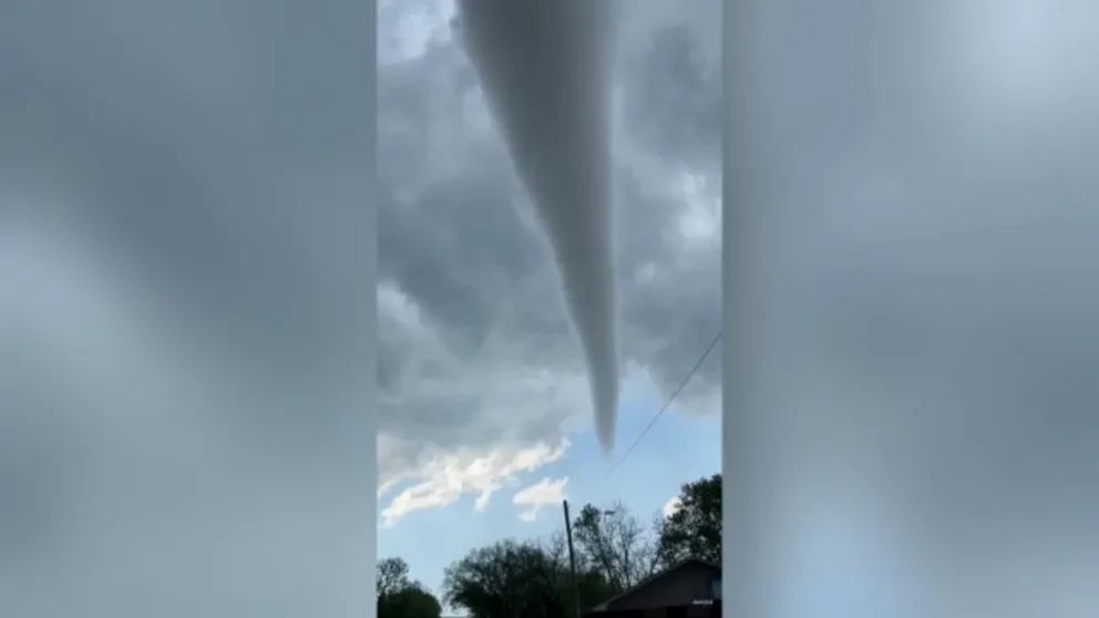 Video recorded by Buster Schmitz shows a large funnel cloud spinning through the air in Westmoreland, Kansas, on Tuesday, April 30, 2024. 