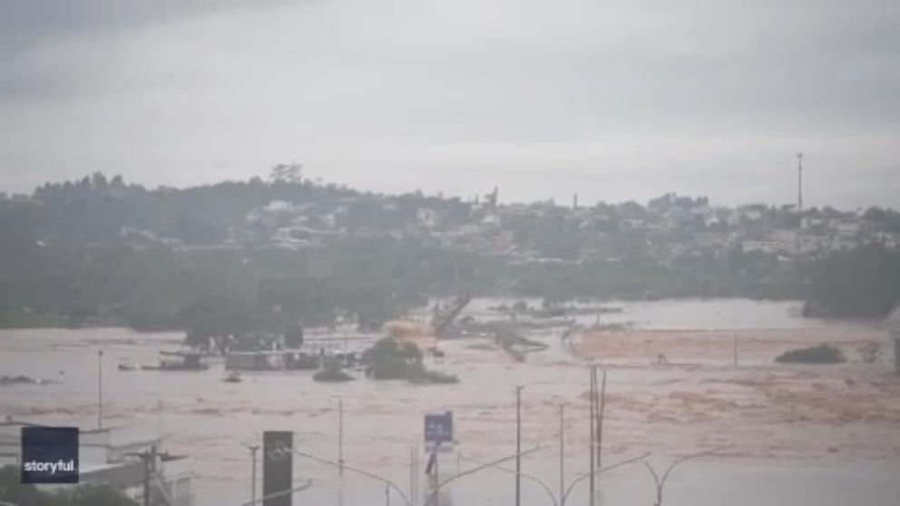 Ongoing rain in the southern Brazilian state of Rio Grande do Sul caused a ferry boat to capsize after hitting a bridge on the swollen Taquari River on Thursday. (Video: Matheus Hinterholz via Storyful)