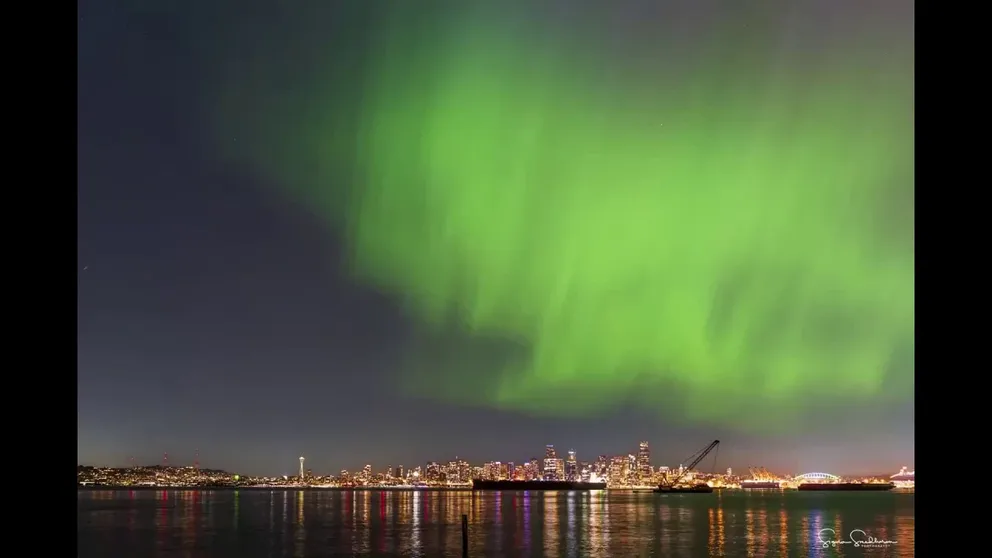 The sky above Seattle turned green when an amazing Northern Lights display danced above the city in a stunning time-lapse video on Friday, May 10, 2024.