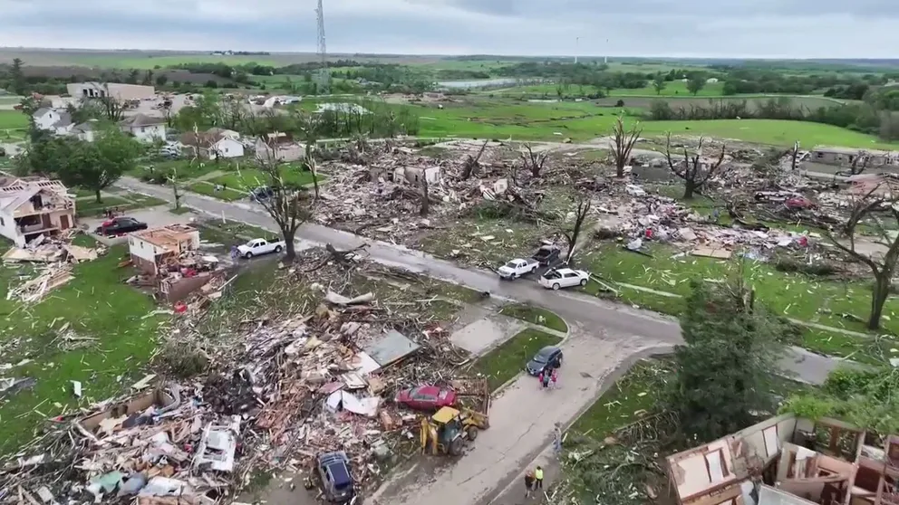 A violent tornado tore through central Iowa on Tuesday causing destruction in the town of Greenfield. Drone video showed several structures that were leveled and residents working to find storm victims.