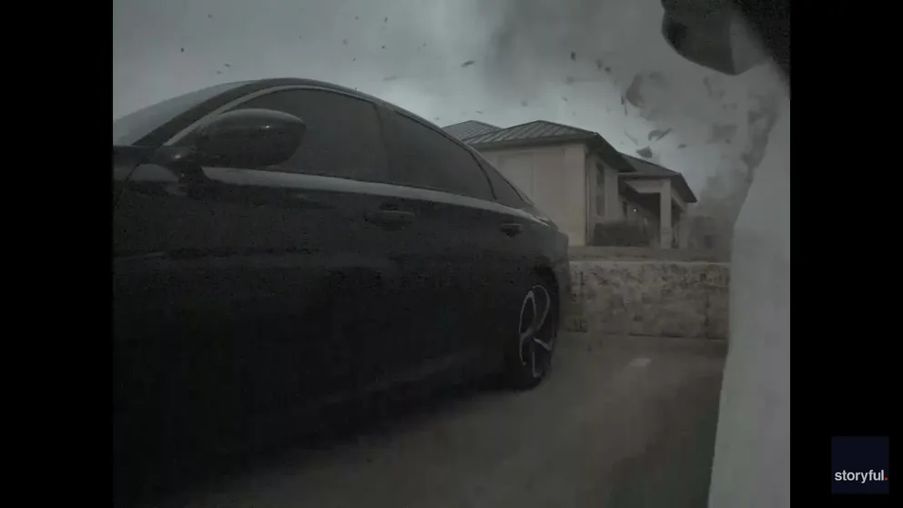 A Tesla dashcam was rolling when an EF-2 tornado tore through Temple, Texas on Wednesday, leaving a trail of damage but luckily no serious injuries. 