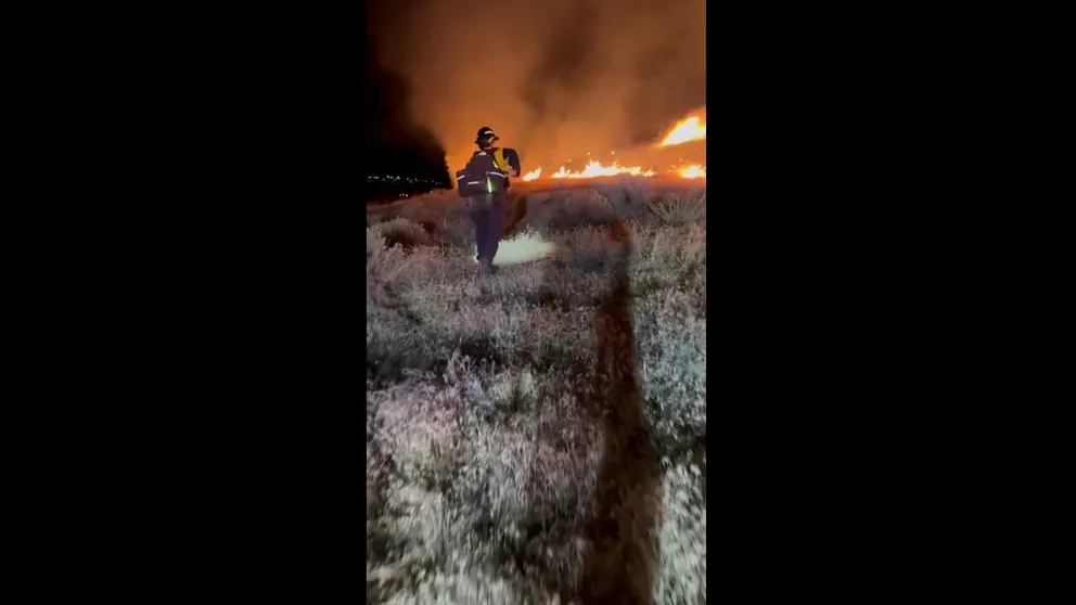 A video recorded late Tuesday night shows firefighters working to contain and extinguish the Sullivan Fire, which broke out in the community of Sparks outside Reno in Nevada.