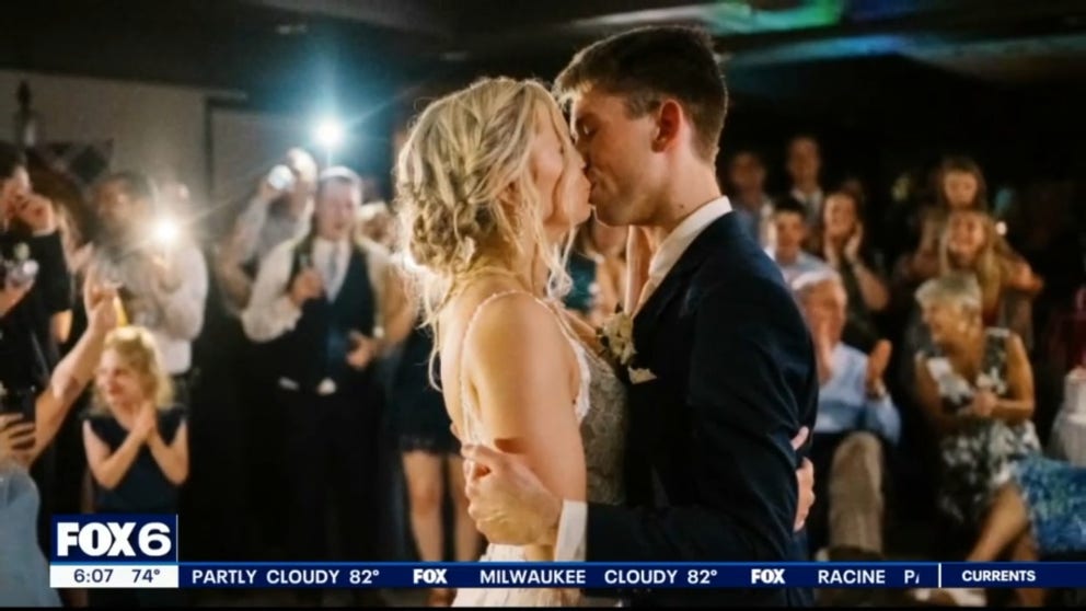 Severe storms did not stop one couple from sharing a special first dance while taking shelter in Lake Geneva on their wedding day.