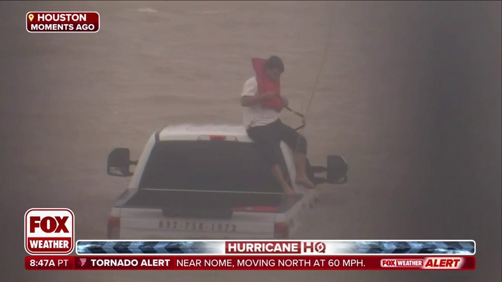 A man was found stranded on the roof of his truck as floodwaters continued to rise in the Houston area on Monday after Hurricane Beryl crashed ashore along the central Texas coast.