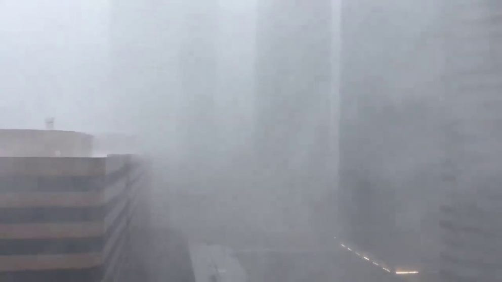 Hurricane Beryl made landfall early Monday morning, bringing heavy rain and strong winds. Views from downtown Houston show both the rain and wind whip through the buildings. 