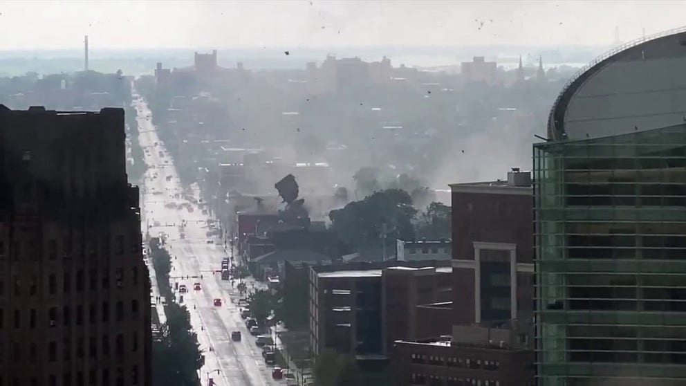 National Weather Service video shows a waterspout coming onshore into downtown Buffalo, New York on Monday ripping part of a roof of a building on Niagara Street.