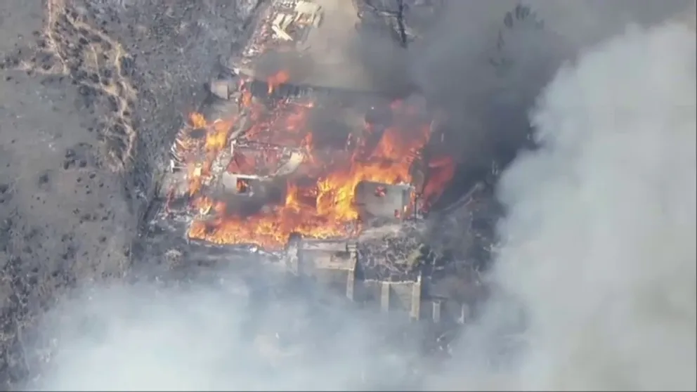 Officials with the San Bernardino County Fire Protection District said that at least four structures were damaged and two were destroyed during the Edgehill Fire on Monday. Gusty winds and temperatures above 100 degrees helped the fire spread on the Little Mountain.