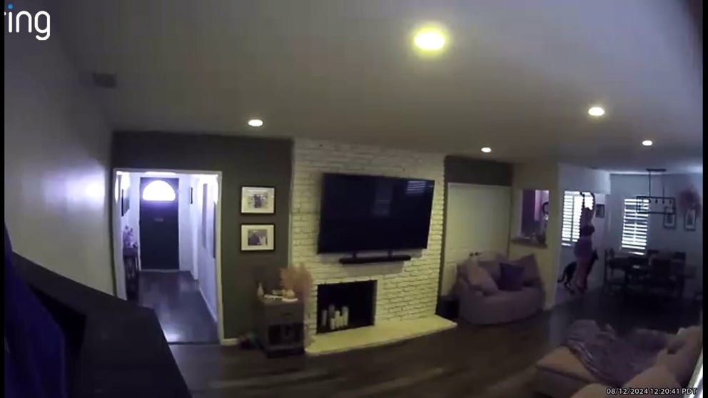 Video shot on Monday shows a woman and her dog seeking safety as her California home shook. (Courtesy: Sabrina Gazdik / TMX)