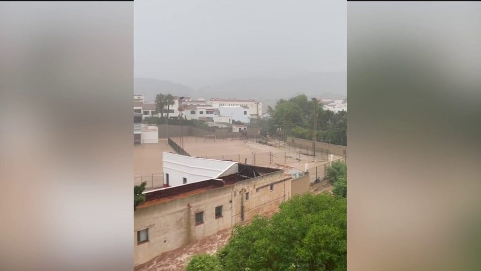 Video shot on Thursday shows how heavy rain turned streets into powerful river rapids in the town of Es Mercadal. (Courtesy: Edith Plantada via Storyful)