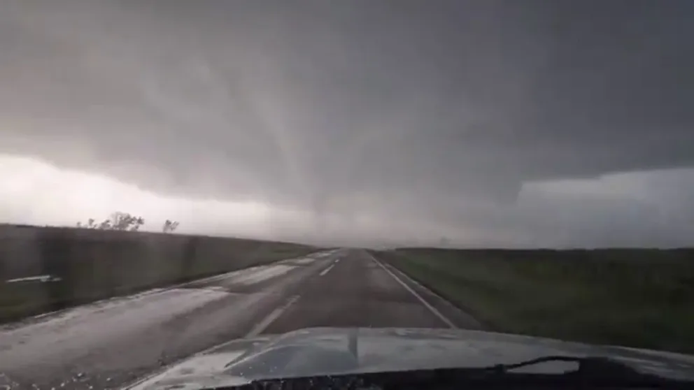 Brandon Copic captured video of a tornado crossing a rural roadway in South Dakota on Wednesday.