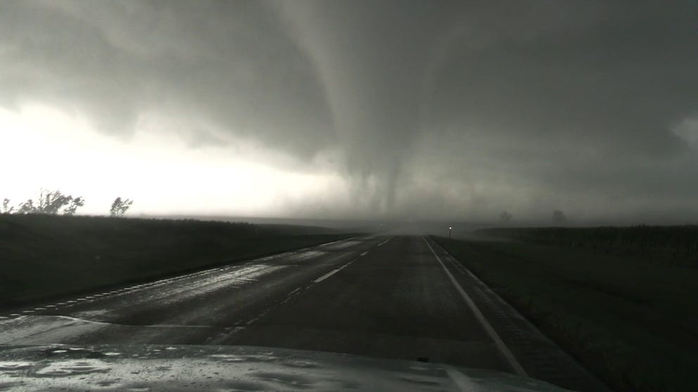 Exclusive FOX Weather Storm Tracker Brandon Copic was in South Dakota during severe weather on Wednesday and captured dramatic video of a large tornado crossing a rural road in Mound City.