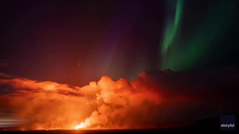 A video recorded in Iceland shows a stunning display of the Northern Lights shining bright as lava shoots into the sky during a volcanic eruption on Friday, Aug. 28, 2024.