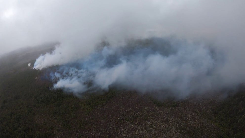 The Kīlauea volcano on Hawai'i erupted Sunday in the East Rift Zone of the volcano. Aerial footage shows smoke from the eruption on Monday