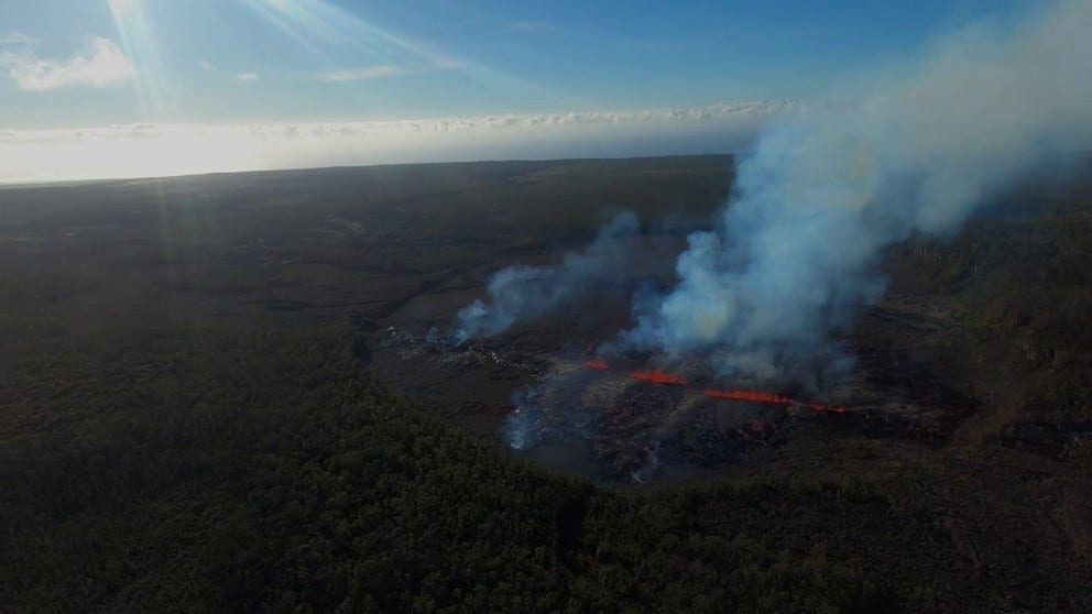 Visuals from the USGS show Kilauea's eruption from the sky on Tuesday. Lava can be seen flowing from a fissure in the volcano.