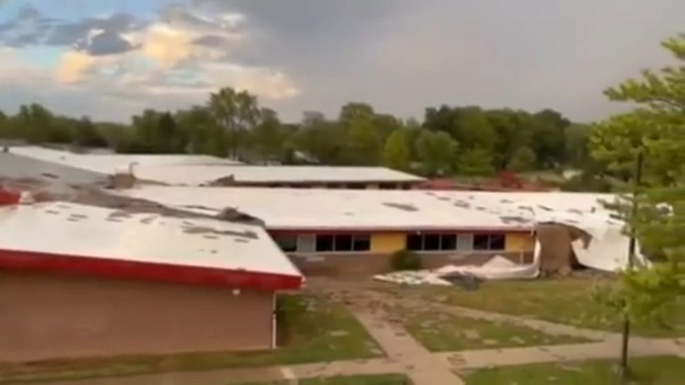 The winds tore the protective roof off the Taylor Elementary School gym in Kokomo, and peeled the roof back down a hallway of classrooms. (Video courtesy: Taylor Community School Corporation.)