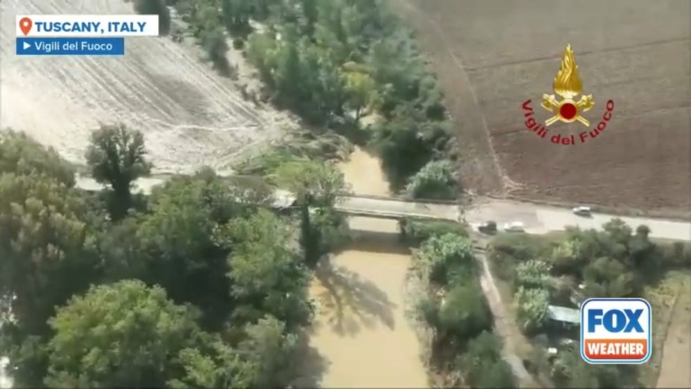 Aerials show fields submerged in water in the central Italian region of Tuscany on Tuesday after torrential rain hit the region of Italy, causing rivers to break their banks.