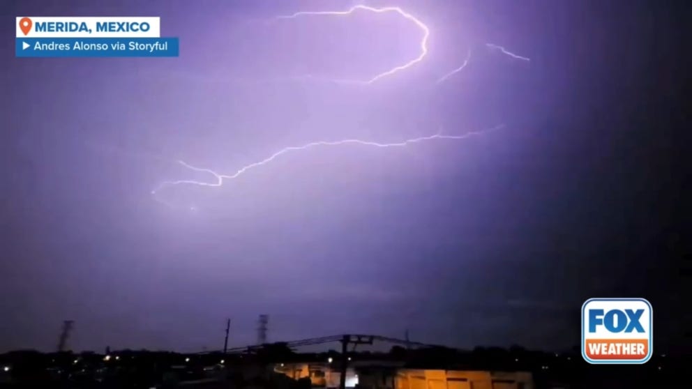 Lightning was seen in the night sky above Merida, in Mexico’s Yucatan Peninsula, early on Wednesday, as the intensifying Tropical Storm Helene passed along the country’s Gulf coast.