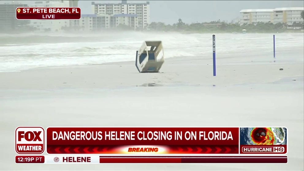 FOX Weather Meteorologist Ian Oliver was reporting from a St. Petersburg beach when powerful winds sent a playhouse tumbling over the sand and surf. Wind gusts in St. Petersburg have exceed 50 mph. Sept. 26, 2024.