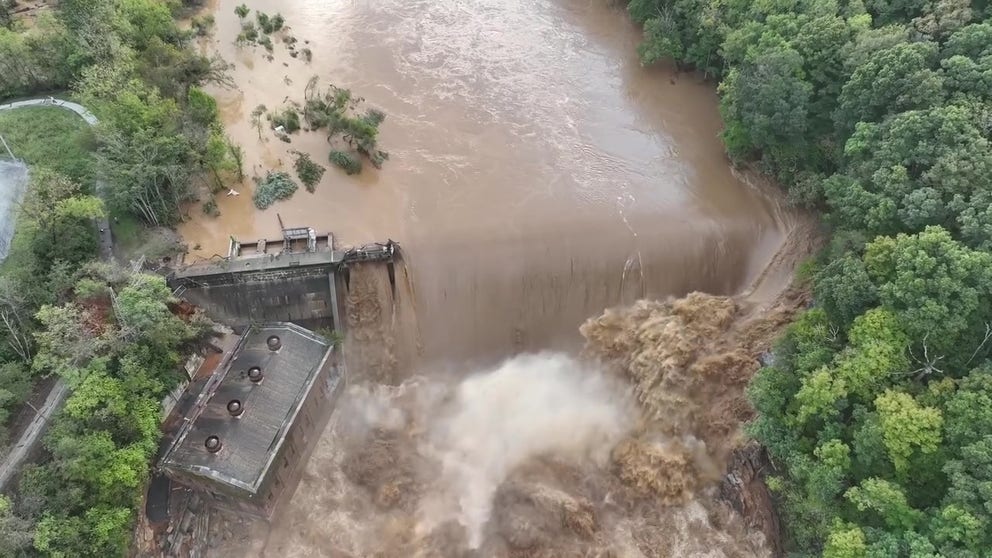 The swollen Nolichucky River sweeps over a dam in eastern Tennessee after 1-2 feet of rain fell in the nearby mountains. (Video courtesy: Tennessee Valley Authority)