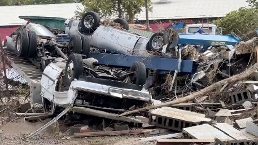 FOX Weather's Robert Ray captured this footage from Asheville, North Carolina, and says it's the worst damage he's discovered so far in the city. Cars are seen upside down covered in mud, homes are completely destroyed, and large piles of debris cover the streets.