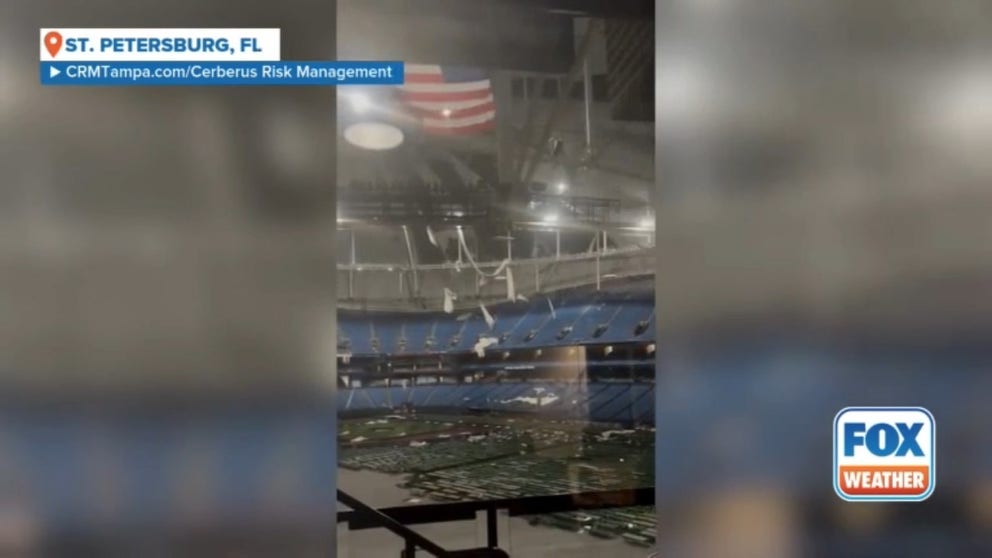 A security agent is offering FOX Weather a first glimpse of the extensive damage Hurricane Milton inflicted on Tropicana Field, home of the Tampa Bay Rays. You can clearly see that most of the fabric covering the stadium's domed roof was shredded, ripped off by the hurricane's ferocious 100-plus mph winds that tore through St. Petersburg, Florida. 