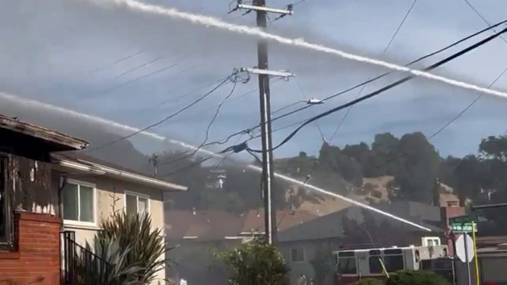 A 13-acre vegetation fire damaged several homes outside of Oakland, local firefighters said on Friday. The cause of the fire has yet to be determined, but during the firefighting efforts, parts of Interstate 580 had to be shut down.