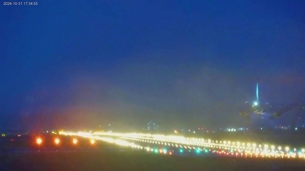 A video recorded in Taiwan shows a plane attempting to land at an airport during Typhoon Kong-rey, but is forced to abort its landing due to the strong winds from the deadly storm.